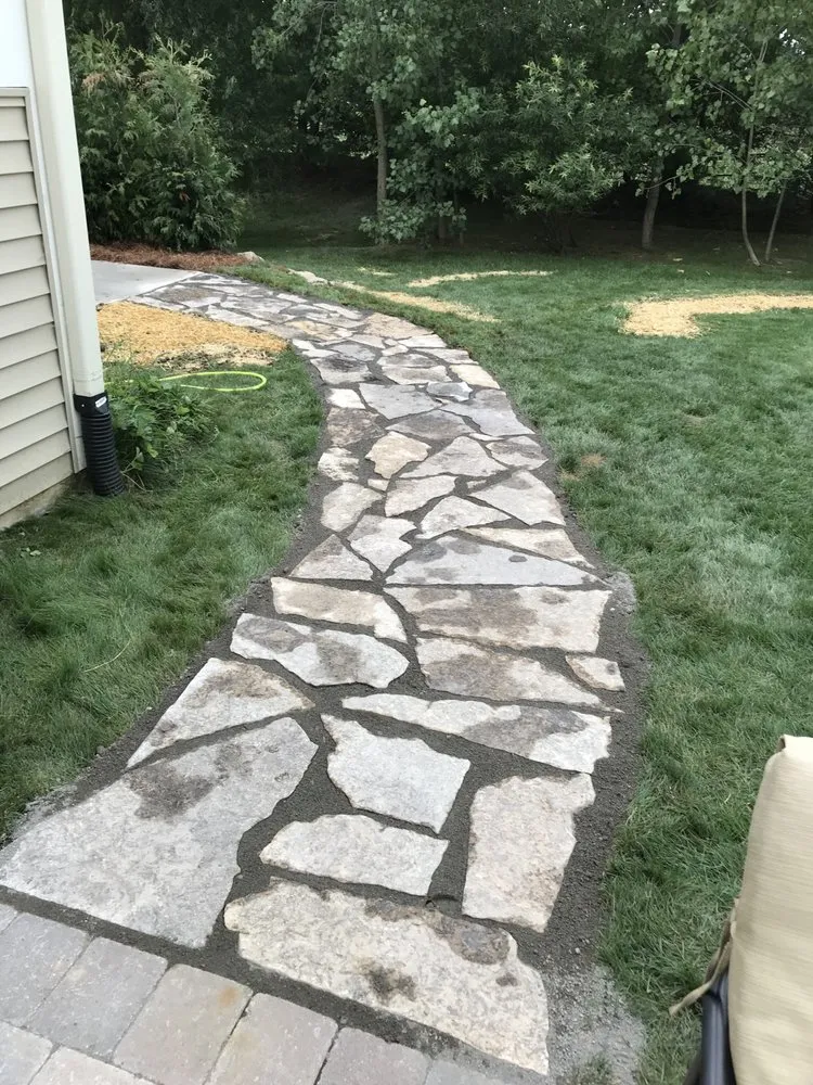 Affordable lawn care service for beautiful yards in Milford, MI by Brien's Services