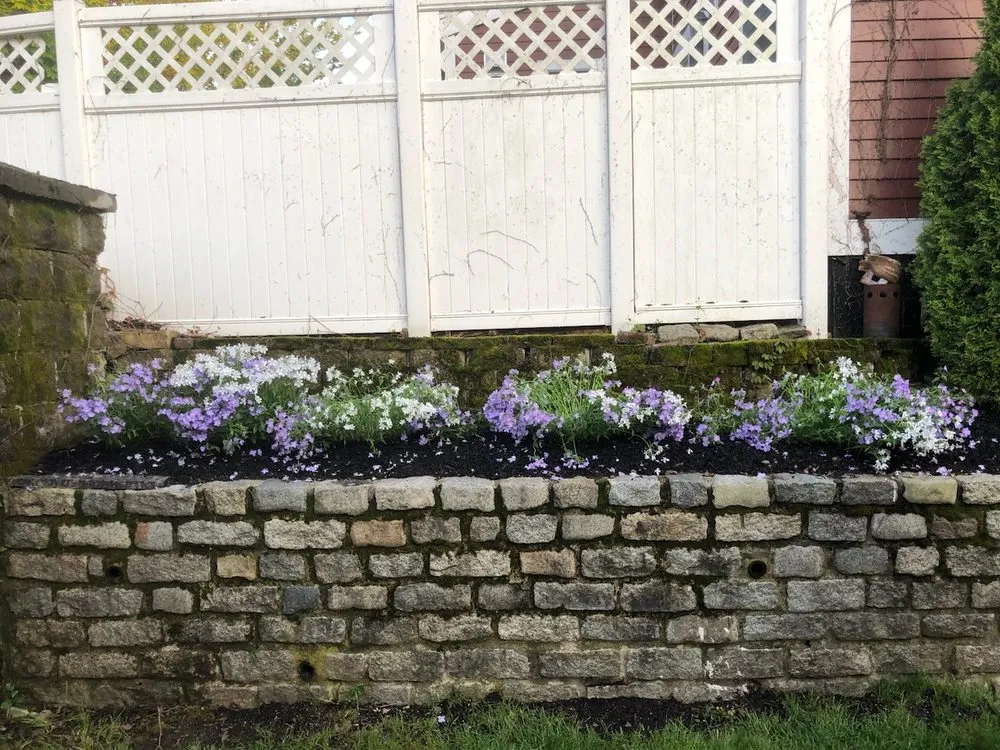 Custom garden landscaping for year-round maintenance across Waltham, MA - Bright Green