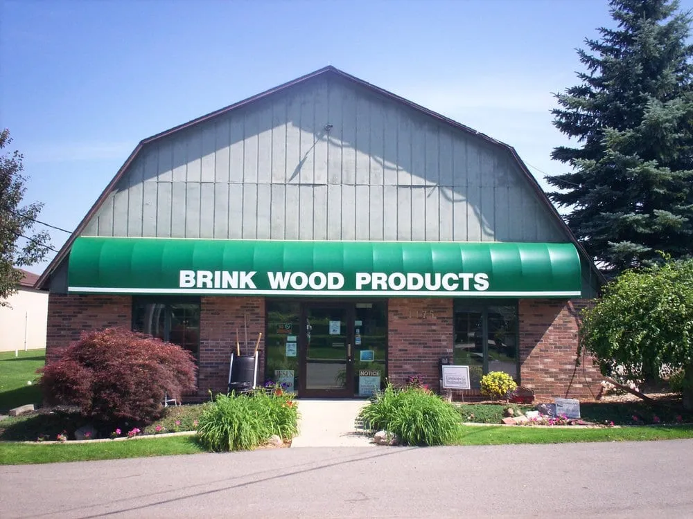 Professional lawn mowing service in Byron Center, MI by Brink Wood Products