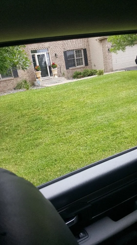 Professional outdoor landscaping for residential properties in Brooklyn Park, MN by Brinkley