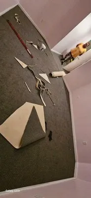 Britton's Lawncare Home Improvement & Hauling Logo