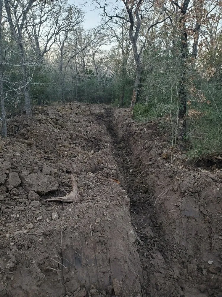 Custom landscape design for year-round maintenance in San Antonio, TX by Bro With A Backhoe