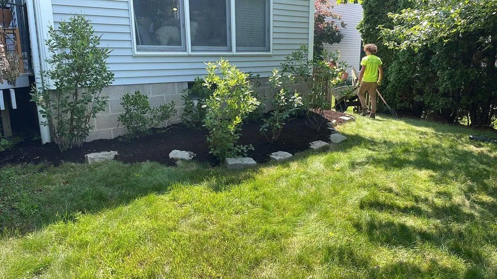 Custom landscaping services for outdoor upgrades in Fairport, NY by Brockman Tree & Lawn Care