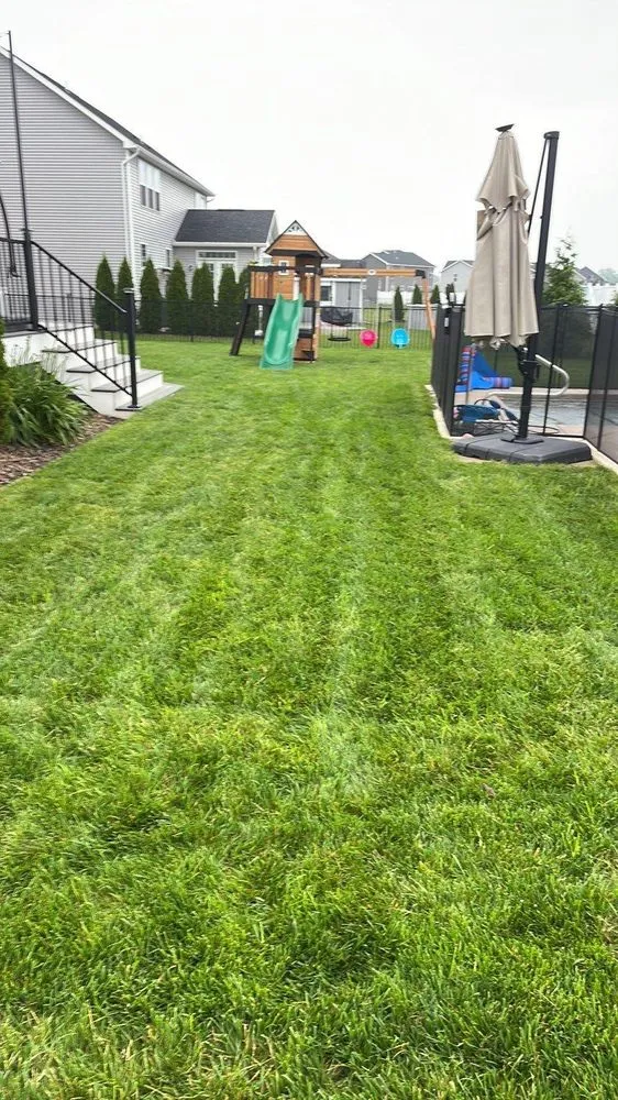 Custom landscape installation in Fairport, NY by Brockman Tree & Lawn Care