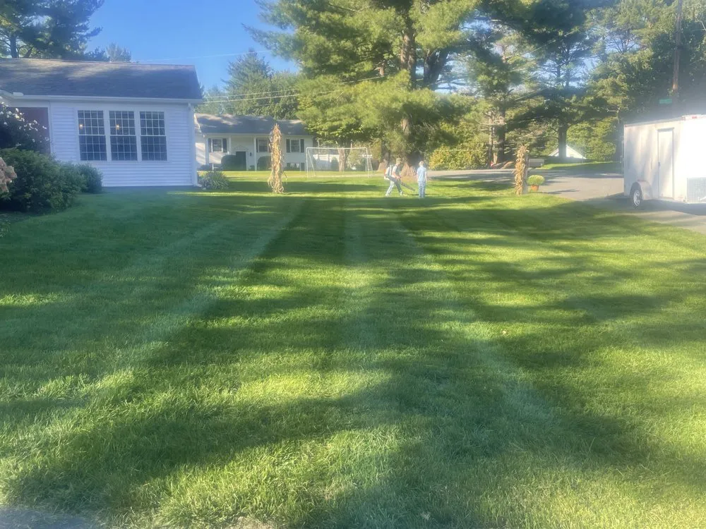 Affordable lawn mowing service for year-round maintenance in Troy, NY by Brooke Brothers Property and Development