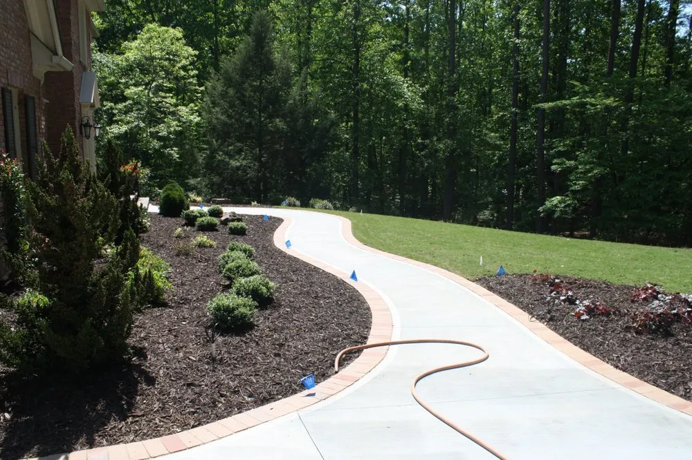 Professional lawn care service in Acworth, GA by Brookes Concrete & Landscape