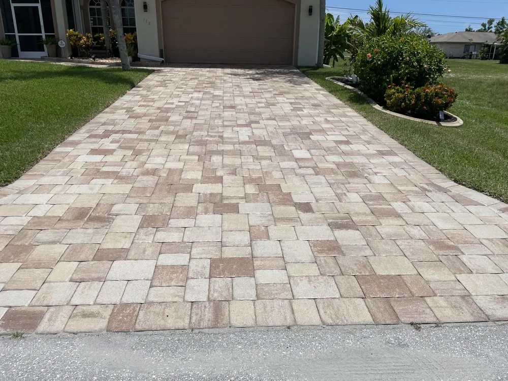 Professional lawn mowing service for year-round maintenance across Cape Coral, FL - Brooklyn Pavers