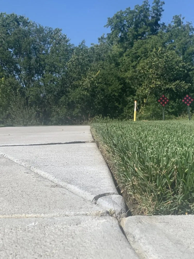 Custom landscape installation for residential properties in Omaha, NE by Brother Nature