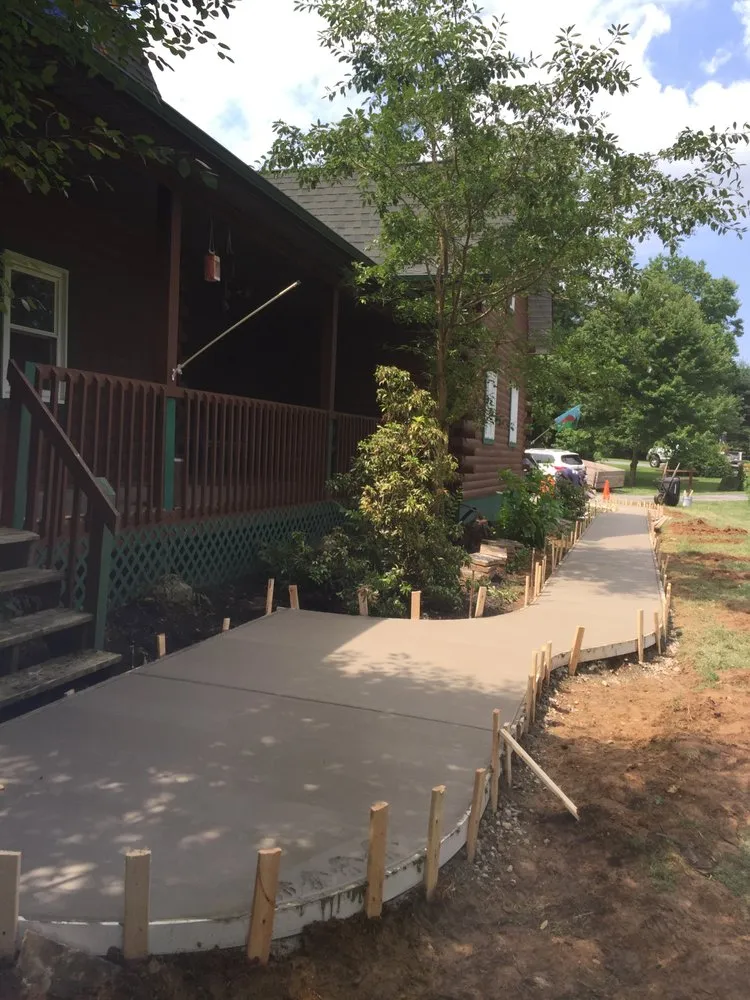 Professional outdoor landscaping with custom design in Aston, PA by Brothers Landscaping & Hardscaping