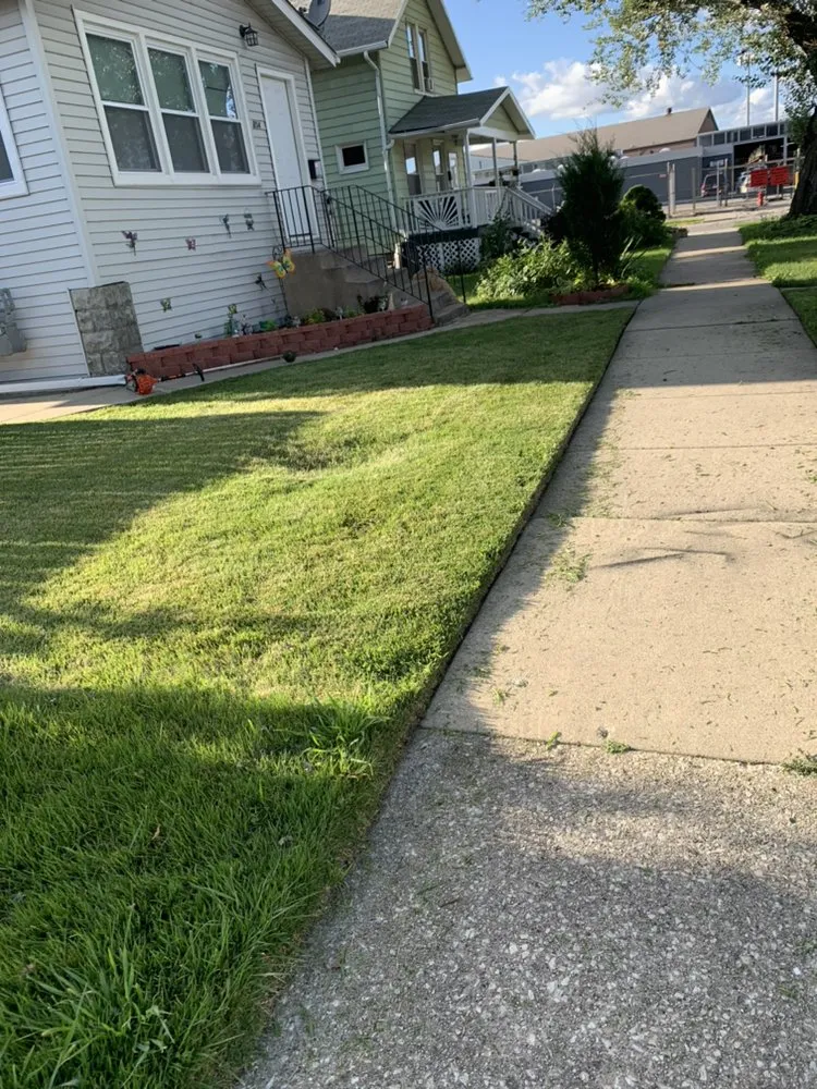 Expert lawn mowing service for homes in Maywood, IL by Brother's Landscaping