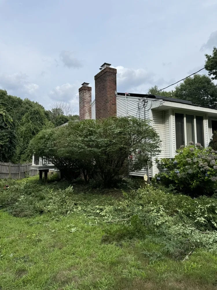 Professional residential landscaping for year-round maintenance in Waltham, MA by Brothers Landscaping