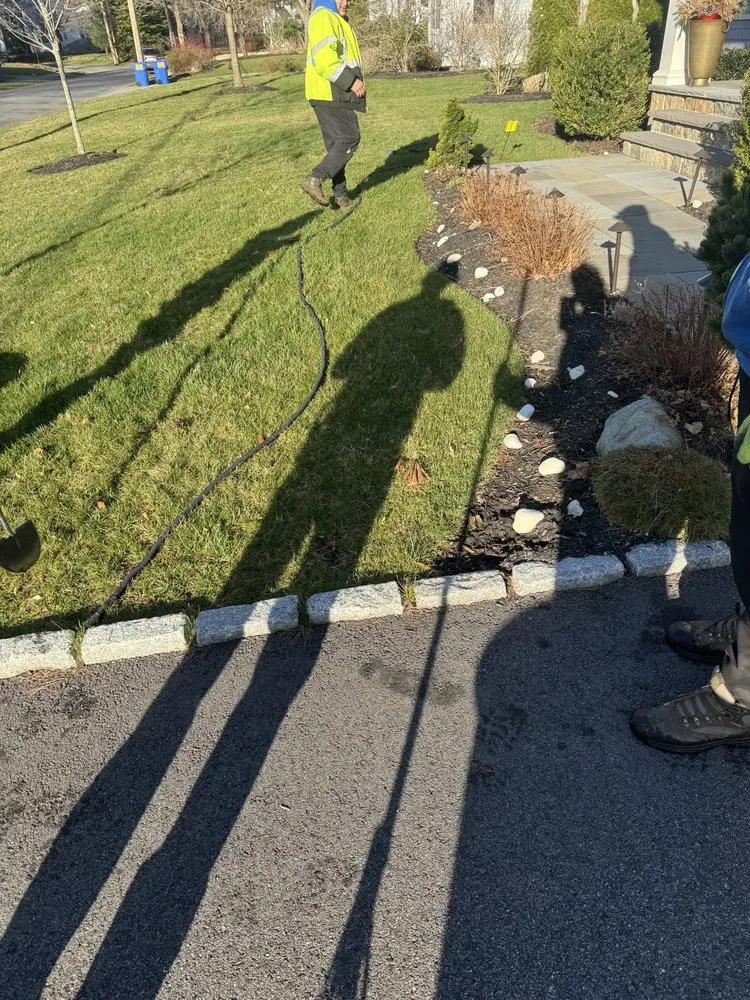 Professional landscape installation in Waltham, MA by Brothers Landscaping