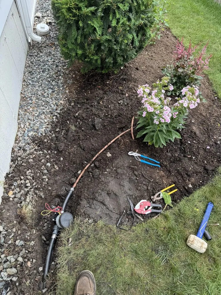 Trusted lawn care service for residential properties in Waltham, MA by Brothers Landscaping