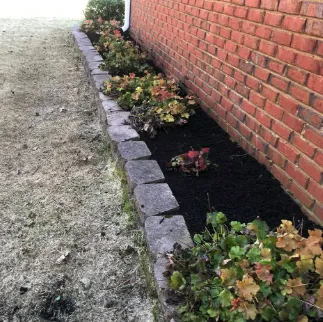 Professional garden landscaping for residential properties in Collierville, TN by Brothers Lawn & Landscape