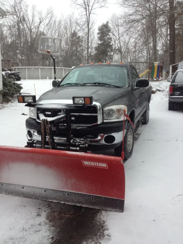 Custom landscape installation for year-round maintenance in Brookfield, CT by Brothers Outdoor Services