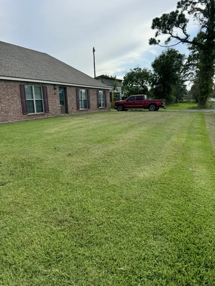 Custom lawn mowing service for homes in Westlake, LA by Broussard Lawn Service