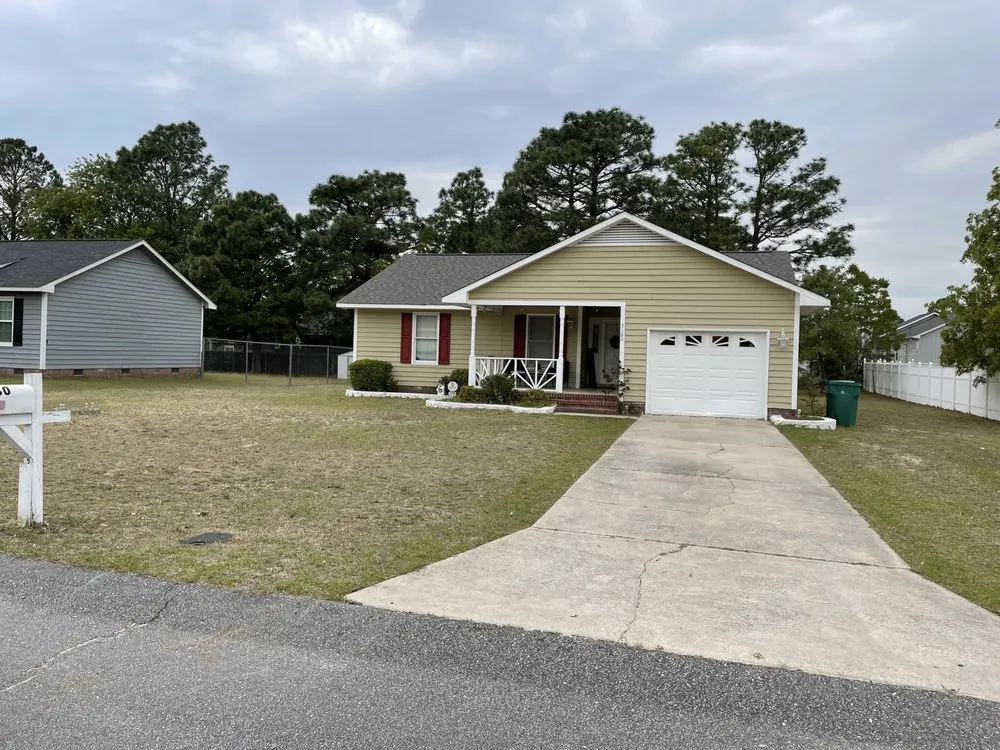 Affordable lawn mowing service with custom design in Fayetteville, NC by Brown Tree And Lawn Care