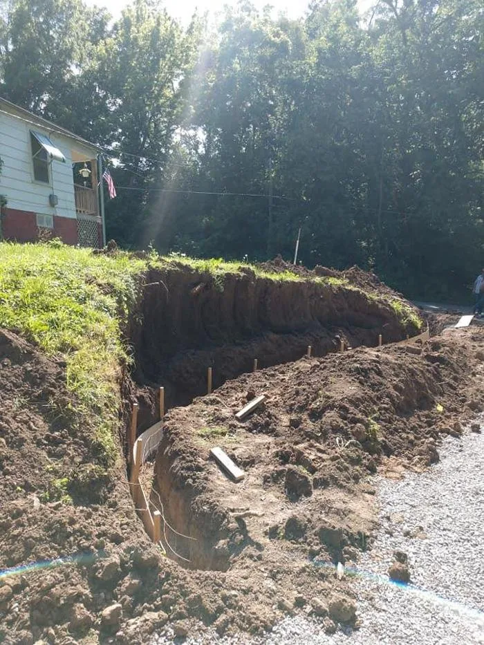 Affordable lawn mowing service for outdoor upgrades in Bedford, IA by Brumfield Seeding and Landscaping