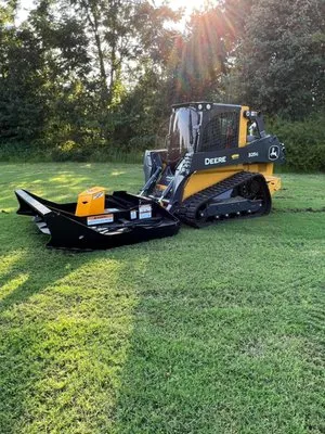 Brush Busters Land Services Logo
