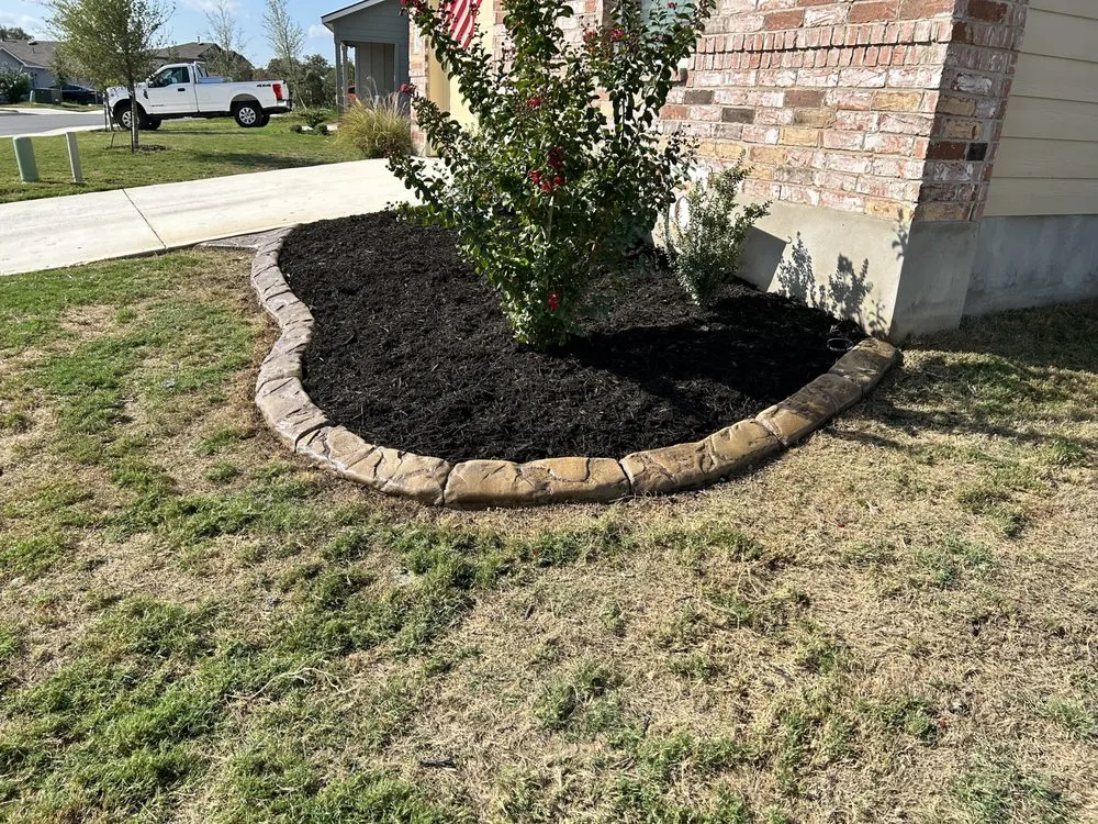 Reliable lawn mowing service with custom design across Pleasanton, TX - Brush Country Curbs & Borders