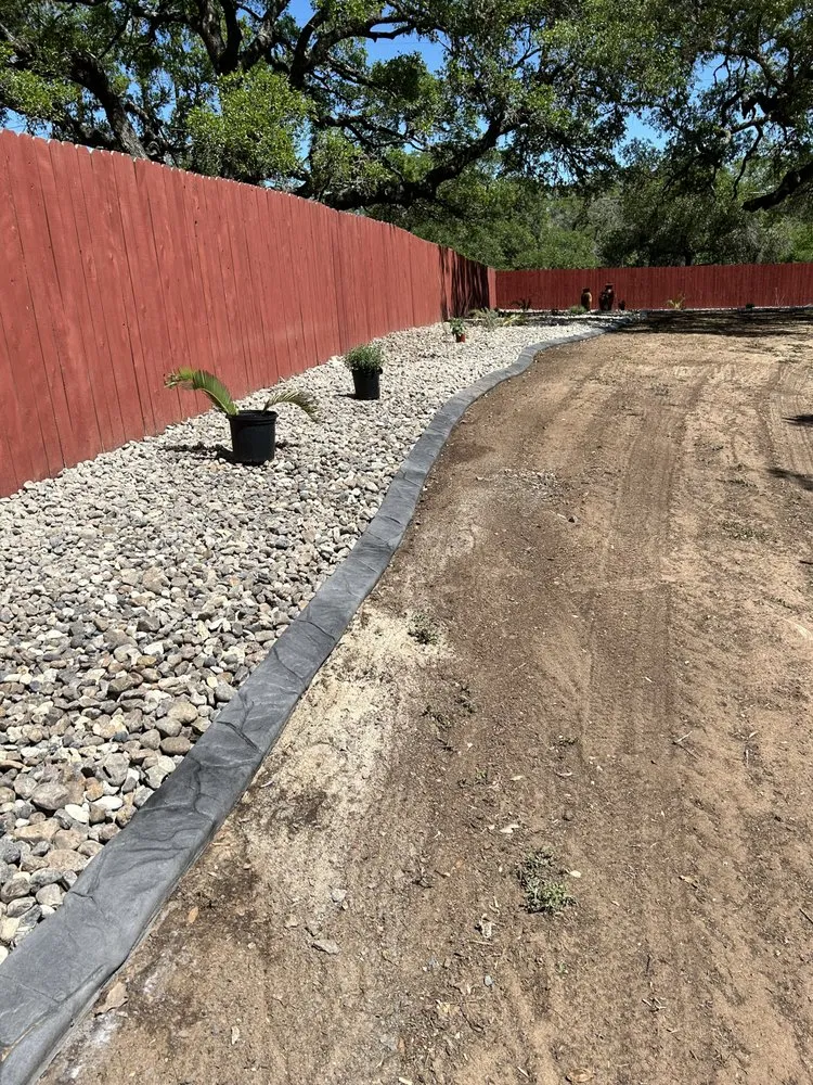 Professional landscape installation for year-round maintenance across Pleasanton, TX - Brush Country Curbs & Borders