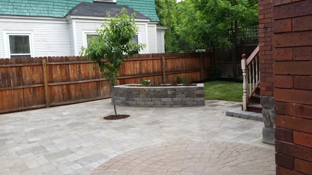 Professional landscaping services for year-round maintenance in Monaca, PA by Bruzzese Landscape and Walls