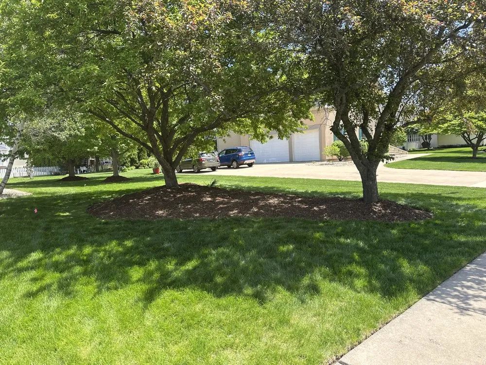 Custom landscape design in Downs, IL by Bryan Property Services