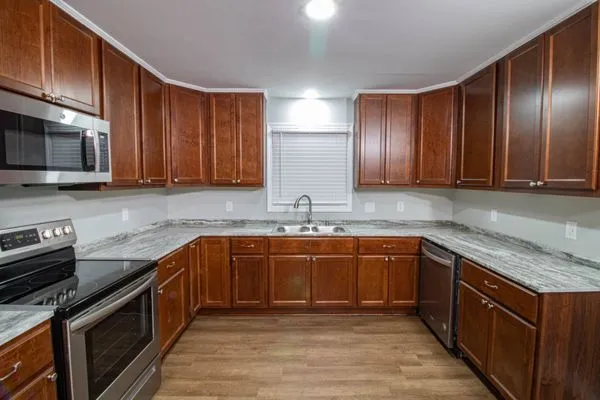 Bryan's Landscaping and Construction Logo