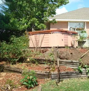 Custom landscape installation for year-round maintenance in Pensacola, FL by Bryan's Lawn Maintenance