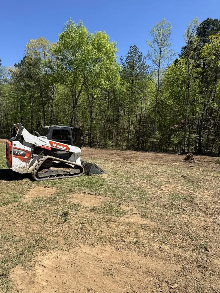 Professional lawn mowing service for year-round maintenance in Charleston, TN by Bryant Excavation and Landscaping