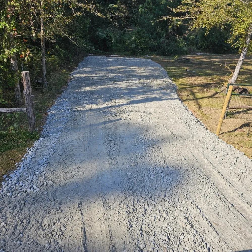 Professional landscaping services for homes in Huntsville, TX by Bryant land services