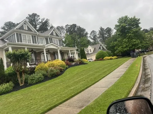 B&T Lawn Services and Maintenance Logo