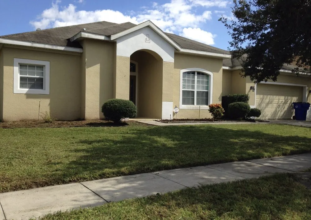 Expert landscaping services for residential properties in St Cloud, FL by Bubba Stumps Lawn Care and Services