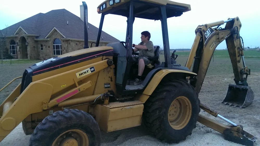 Affordable yard cleanup service for residential properties across Liberty Hill, TX - Bubba's Dirt