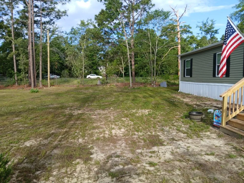 Custom landscape installation in Red Bank, SC by Bubbys Professional lawn care and landscaping.