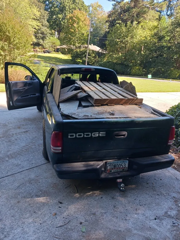 Professional lawn mowing service for year-round maintenance in Conley, GA by Buck With The Truck