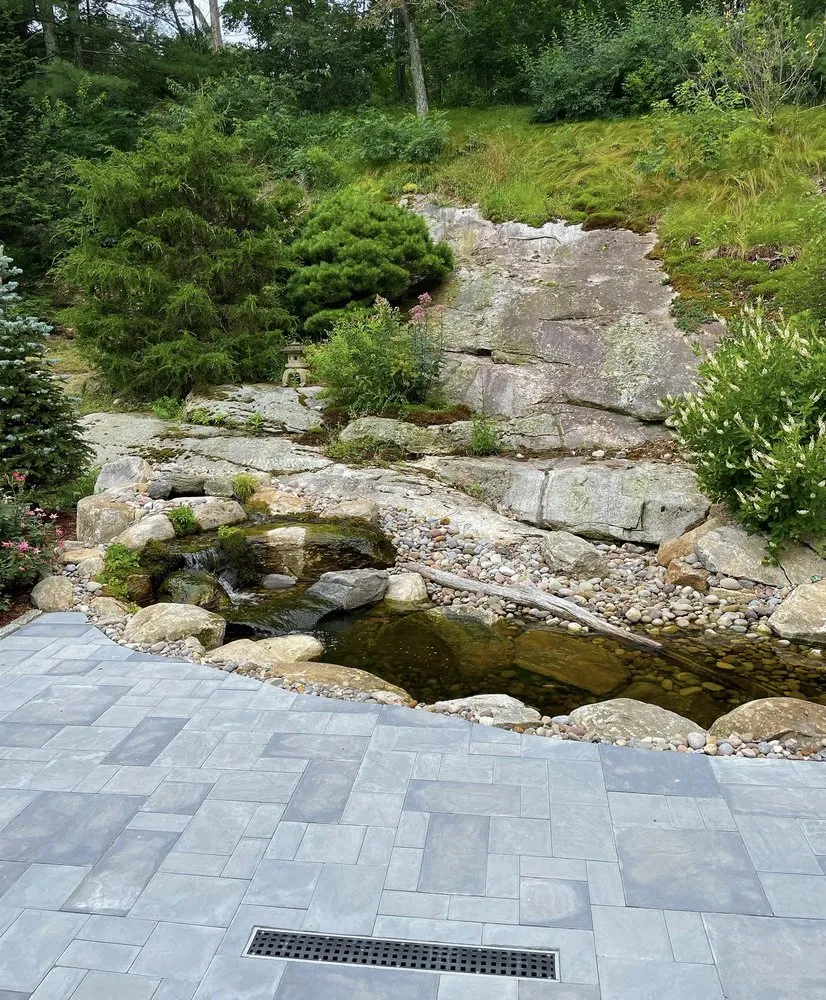 Local lawn care service for year-round maintenance in Essex, CT by Buddy’s Property Services