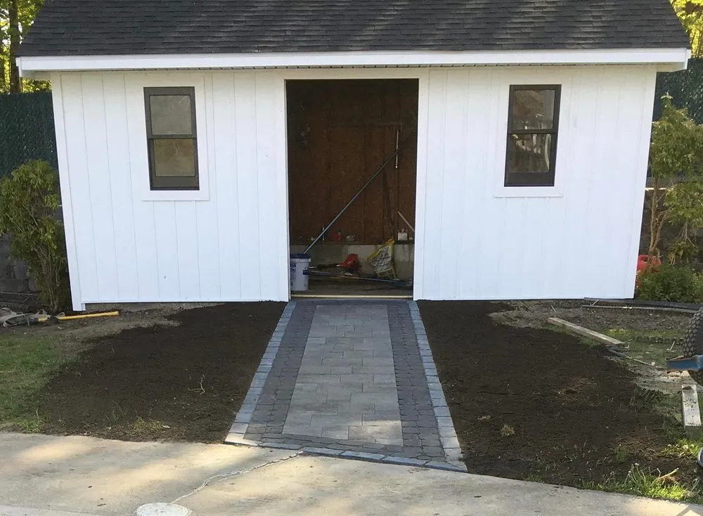 Professional yard cleanup service in Pelham, NH by Budge It Outdoors