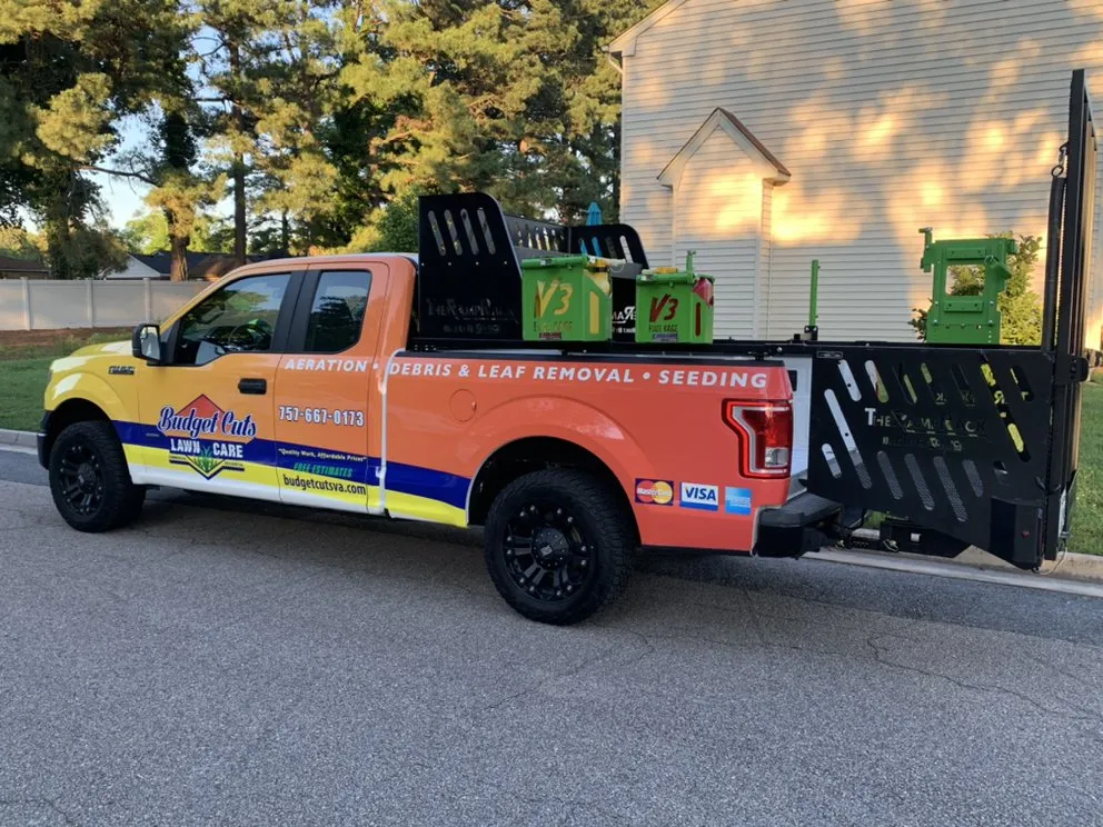 Custom outdoor landscaping for residential properties in Chesapeake, VA by Budget Cuts