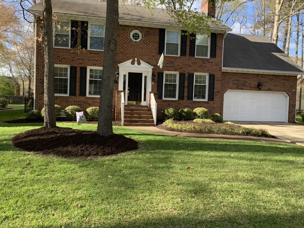 Professional landscape installation for homes in Chesapeake, VA by Budget Cuts