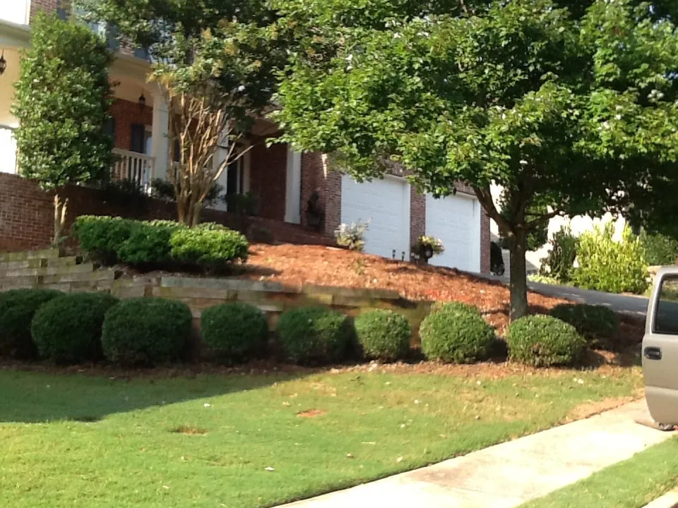 Custom landscape design for homes in Douglasville, GA by BuGLe Lawn & Landscape Design