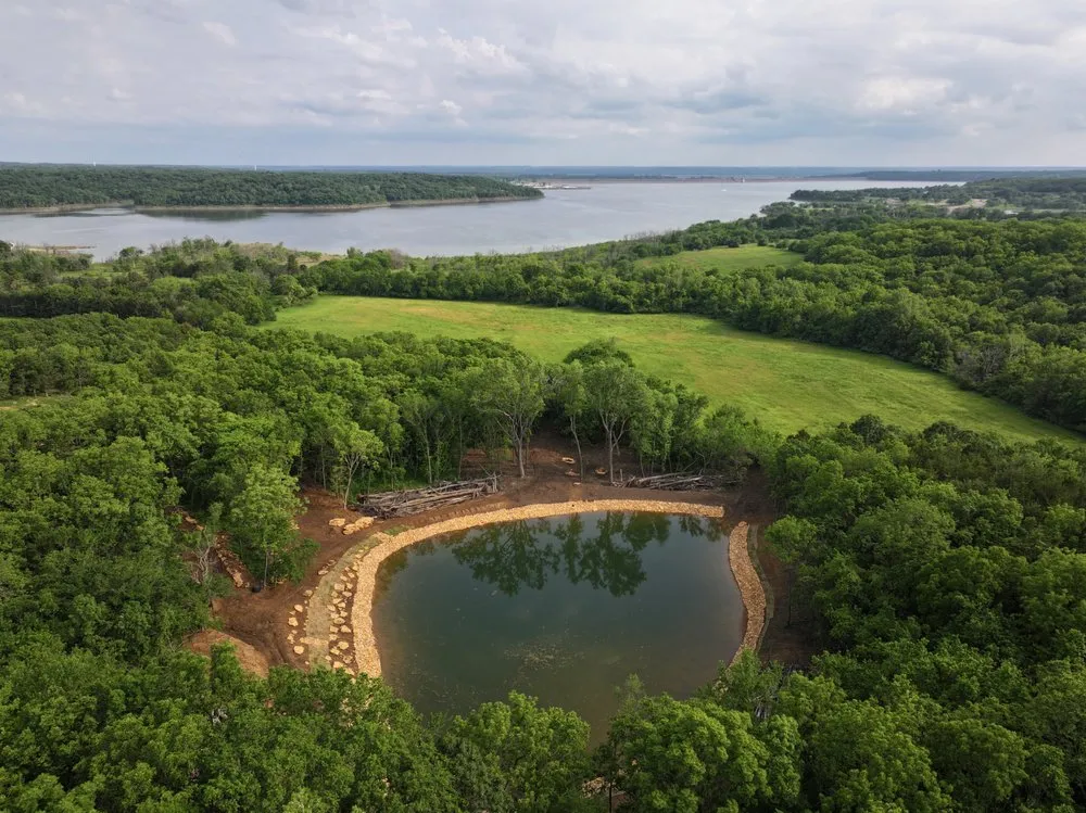 Affordable landscape installation for homes in Basehor, KS by Bulletproof Pond and Lake
