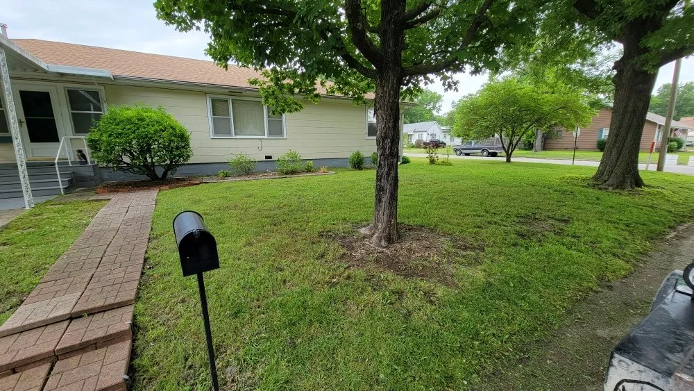 Custom garden landscaping in Caney, KS by Bullpup lawn services