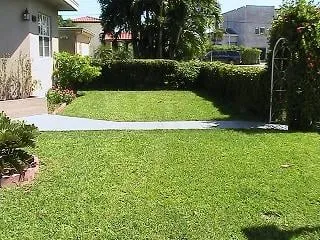 Custom residential landscaping for residential properties across Coral Springs, FL - Bull's Eye Lawn Service