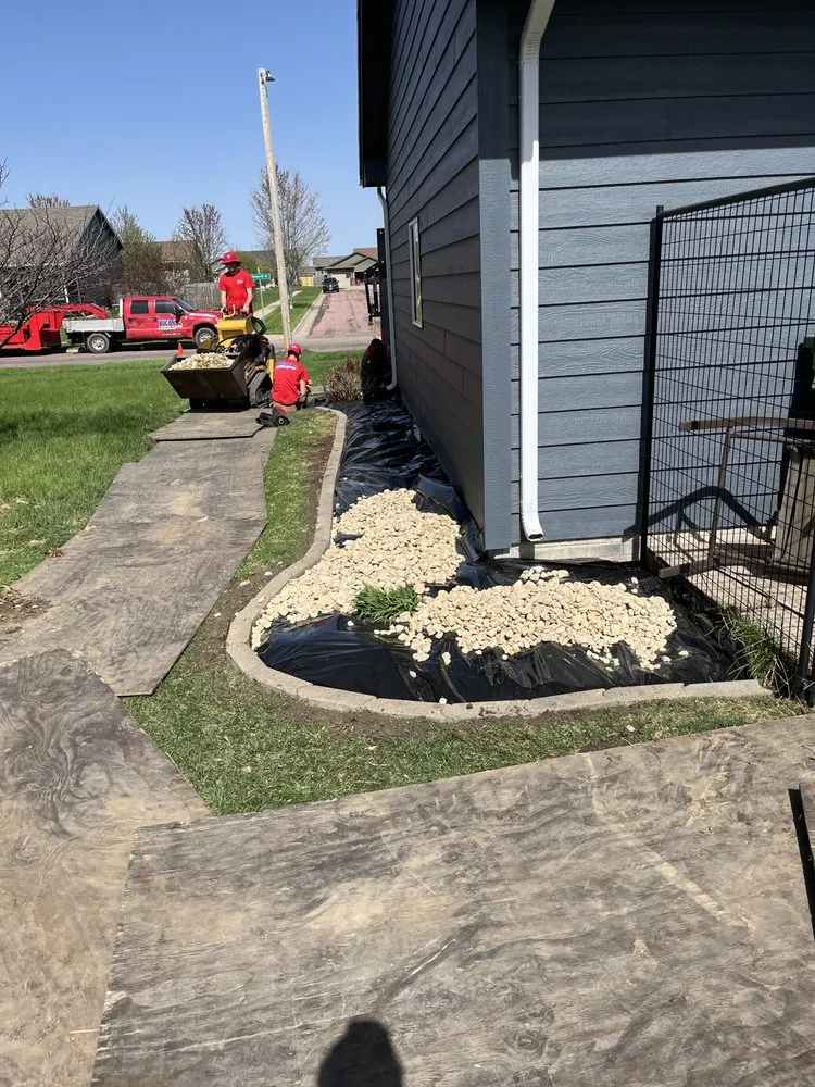 Professional lawn care service experts serving Sioux Falls, SD - Bully Bros