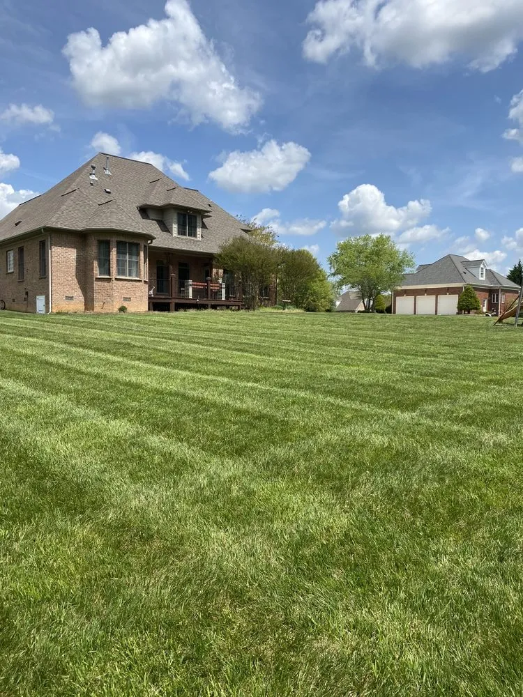 Affordable lawn mowing service for residential properties in Kernersville, NC by Bumgardner Lawn & Landscaping