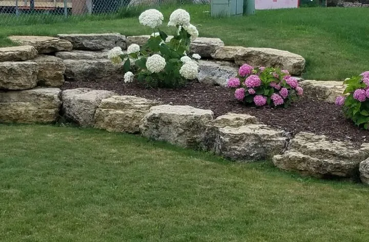 Reliable lawn mowing service with custom design in Madison, WI by Burkle Landscaping