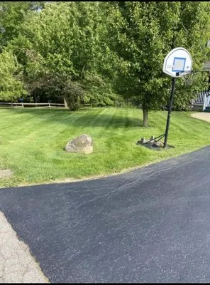 Burk's Lawn & Landscaping Logo