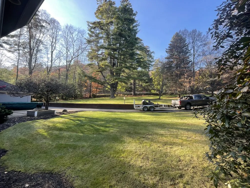 Professional lawn mowing service for residential properties in Queensbury, NY by Burns Property Management