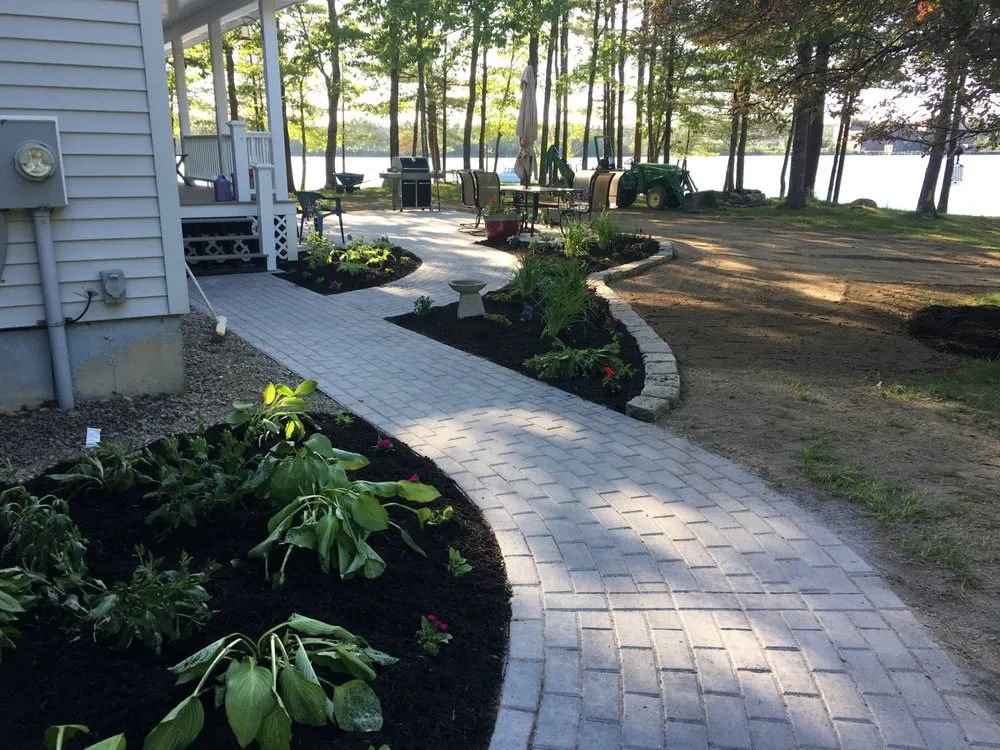 Custom lawn care service for residential properties across Topsham, ME - Bursey Enterprises